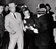 http://lisawallerrogers.files.wordpress.com/2009/09/lee-harvey-oswald-shot-by-jack-ruby-in-the-basement-of-the-dallas-police-department-sunday-november-24-1963-2-days-after-the-kennedy-assassination.jpg?w=468&h=411